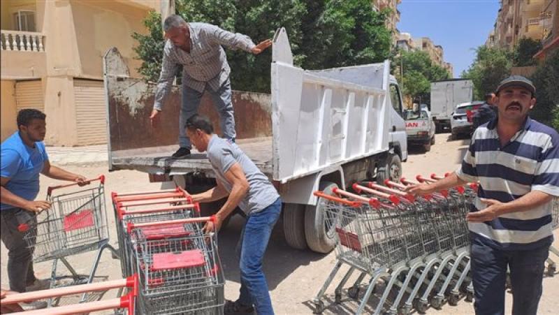 رفع إشغالات وحواجز حديدية